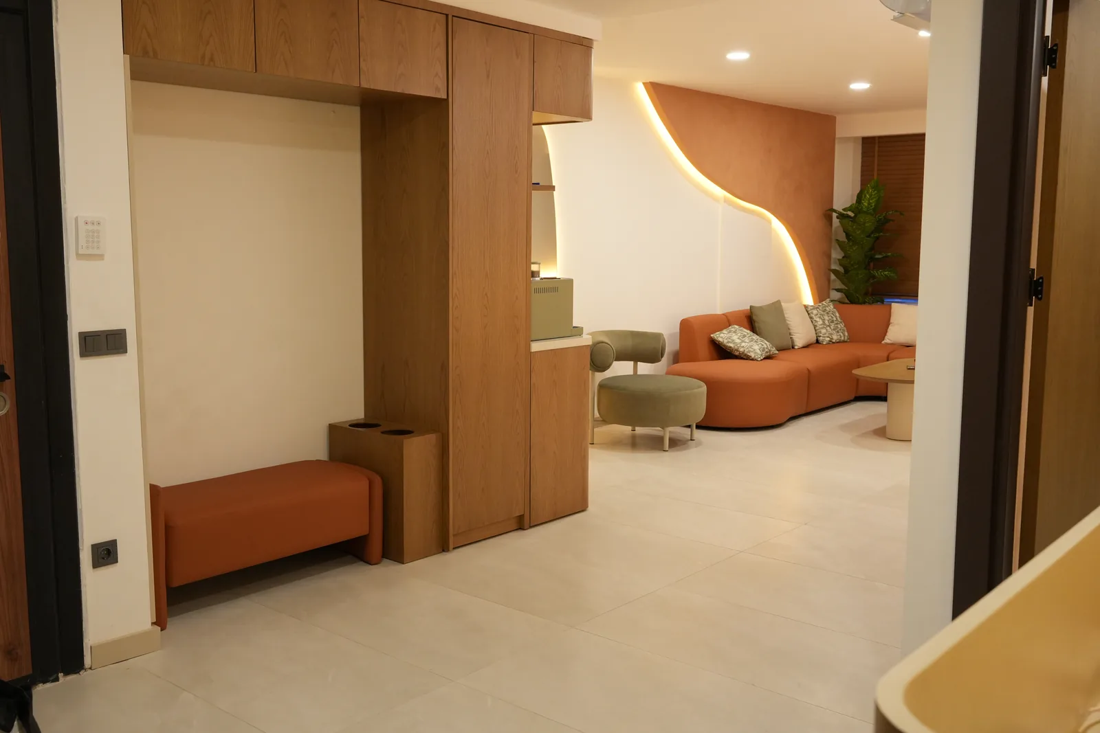 Entrance and cloakroom area of the practice, with the waiting lounge beyond